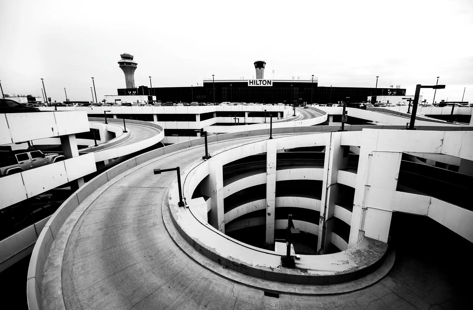 Multi-level parking garage with a spiral ramp at a US airport